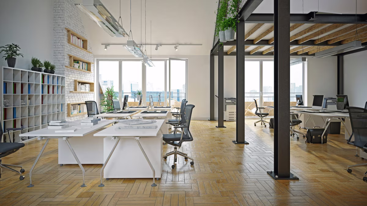 Eco-friendly loft office with modular desks, ergonomic chairs, and natural elements