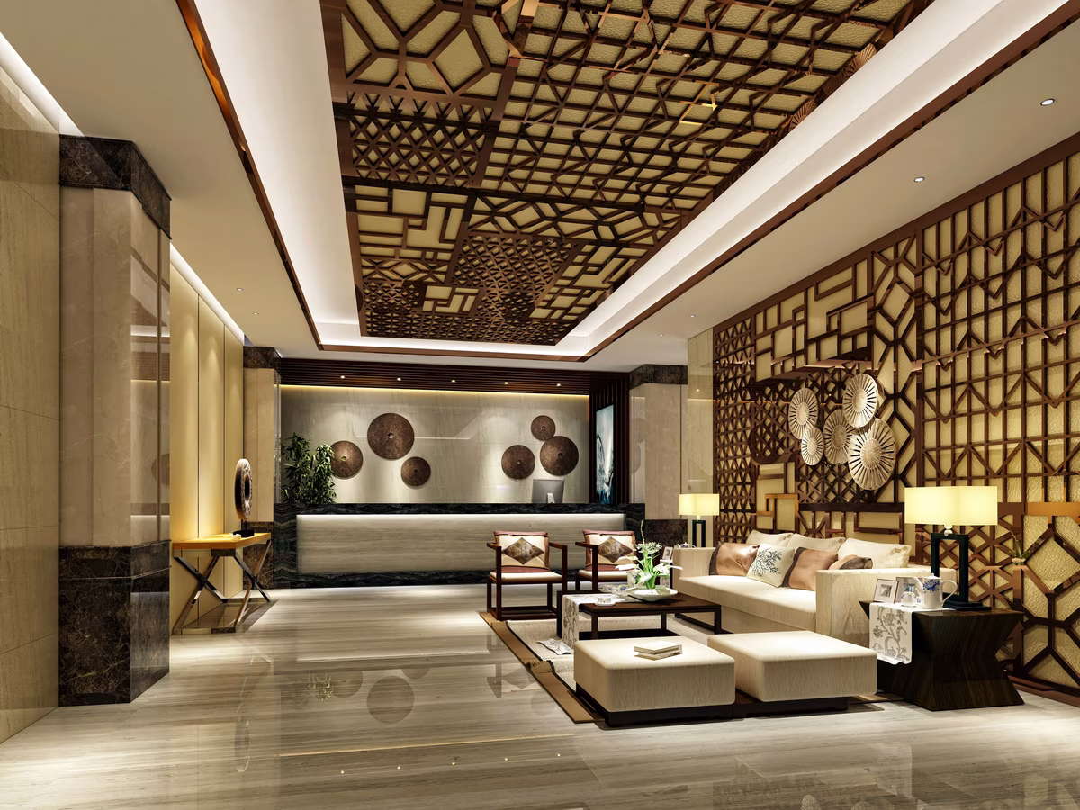 Luxurious oriental lobby with plush seating, decorative ceiling, and warm lighting