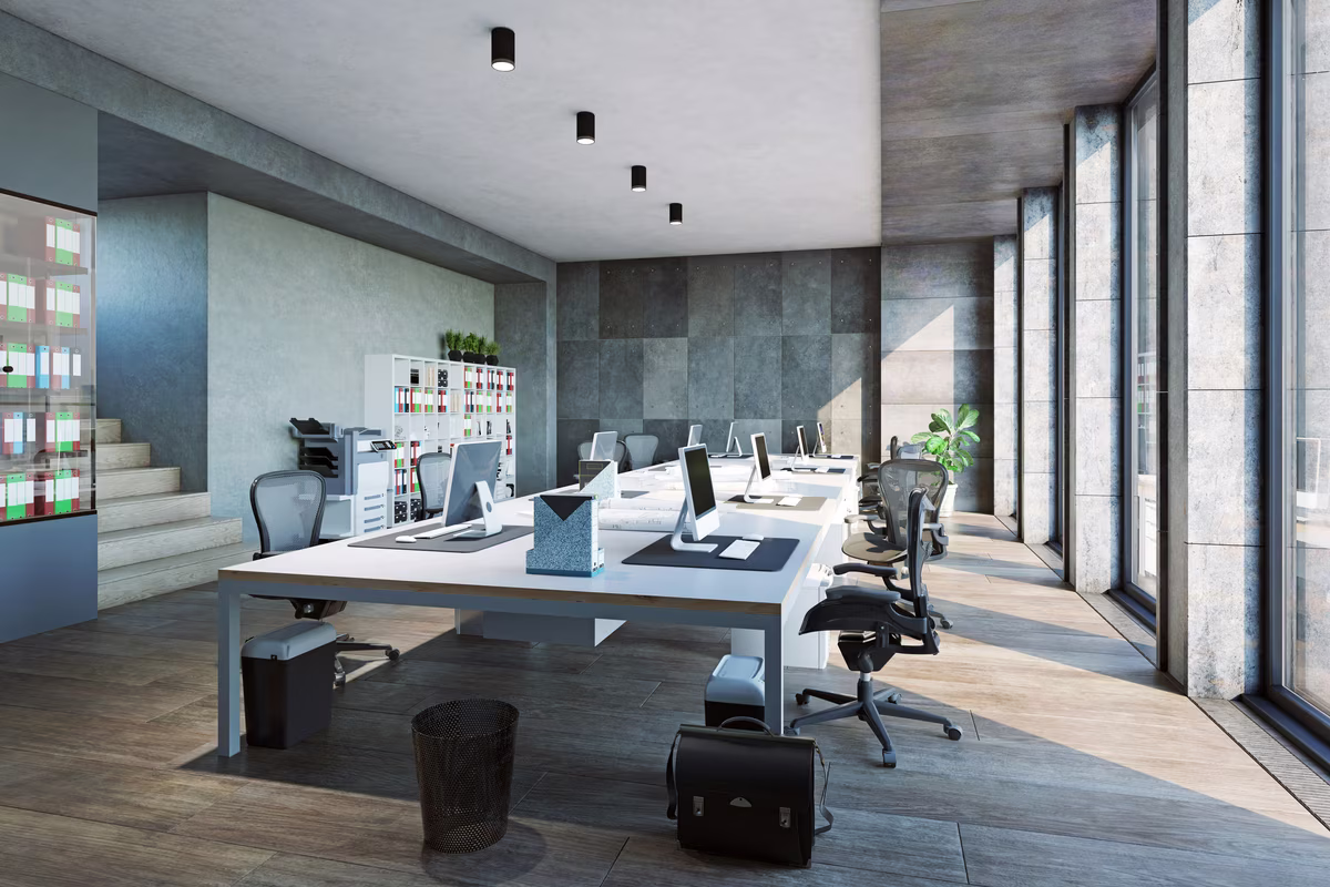 Sleek modern workspace with white desks, ergonomic chairs, and large windows