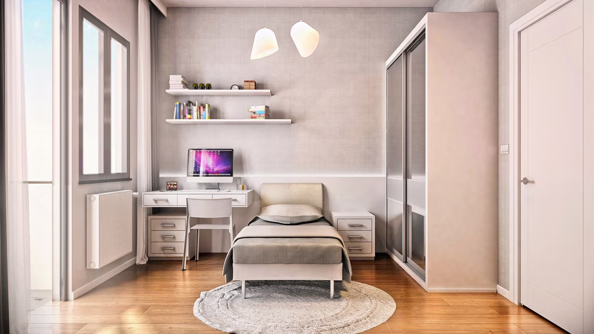 Minimalist teen bedroom with integrated study desk and modern pendant lighting