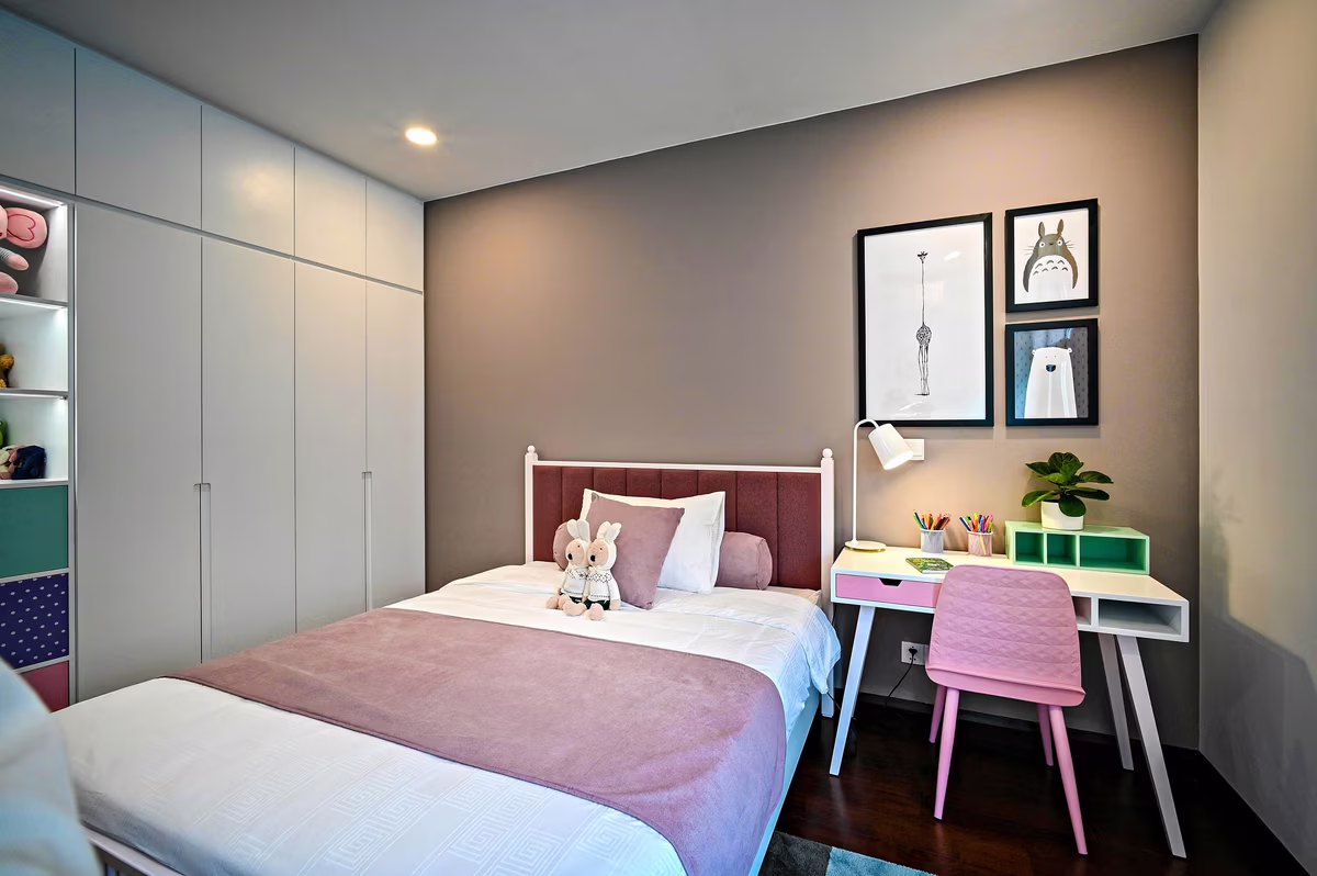 Modern teen bedroom with anime wall art and compact study area