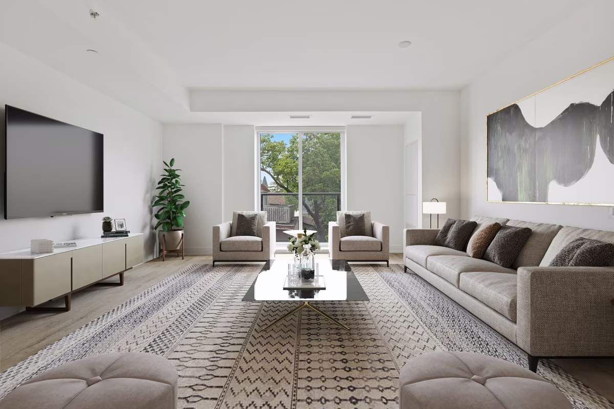 Modern living room with geometric rug and grey sectional