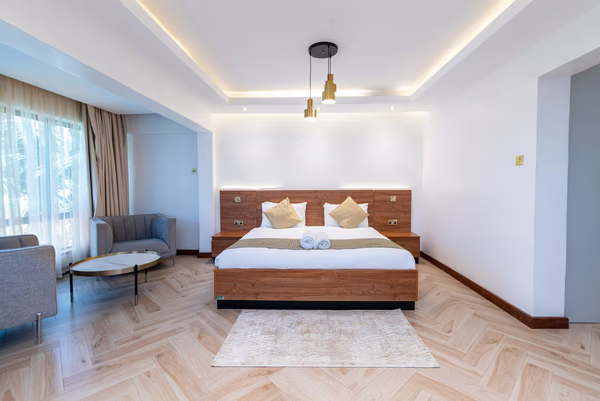 Contemporary luxury master bedroom with wooden accents and LED lighting