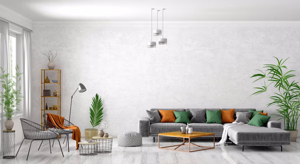 Scandinavian living room with grey sofa and colorful accent pillows