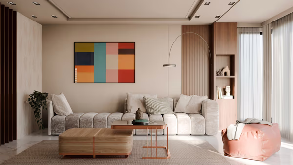 Modern living room with colorful geometric artwork and neutral furniture